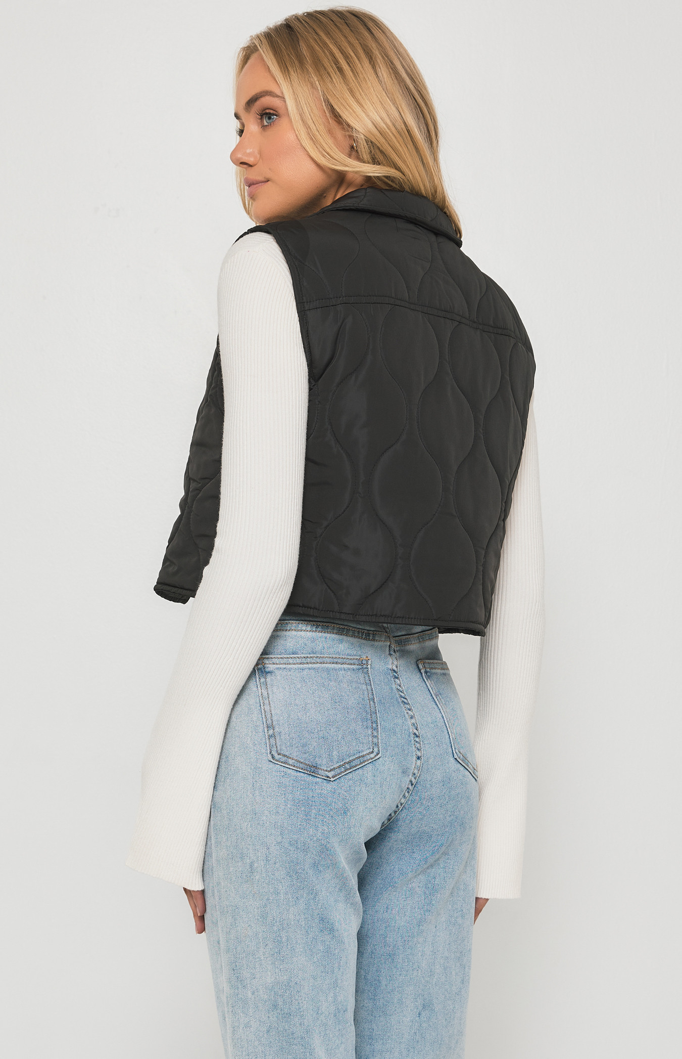 Black quilted puffer on sale vest